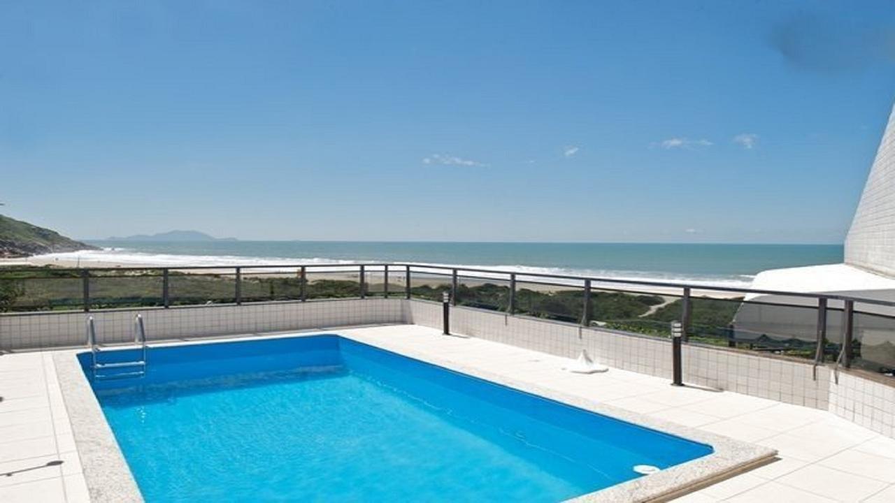 フロリアノポリスLinda Cobertura Frente Mar Com Piscina Privativa E Pe Na Areia!アパートメント エクステリア 写真
