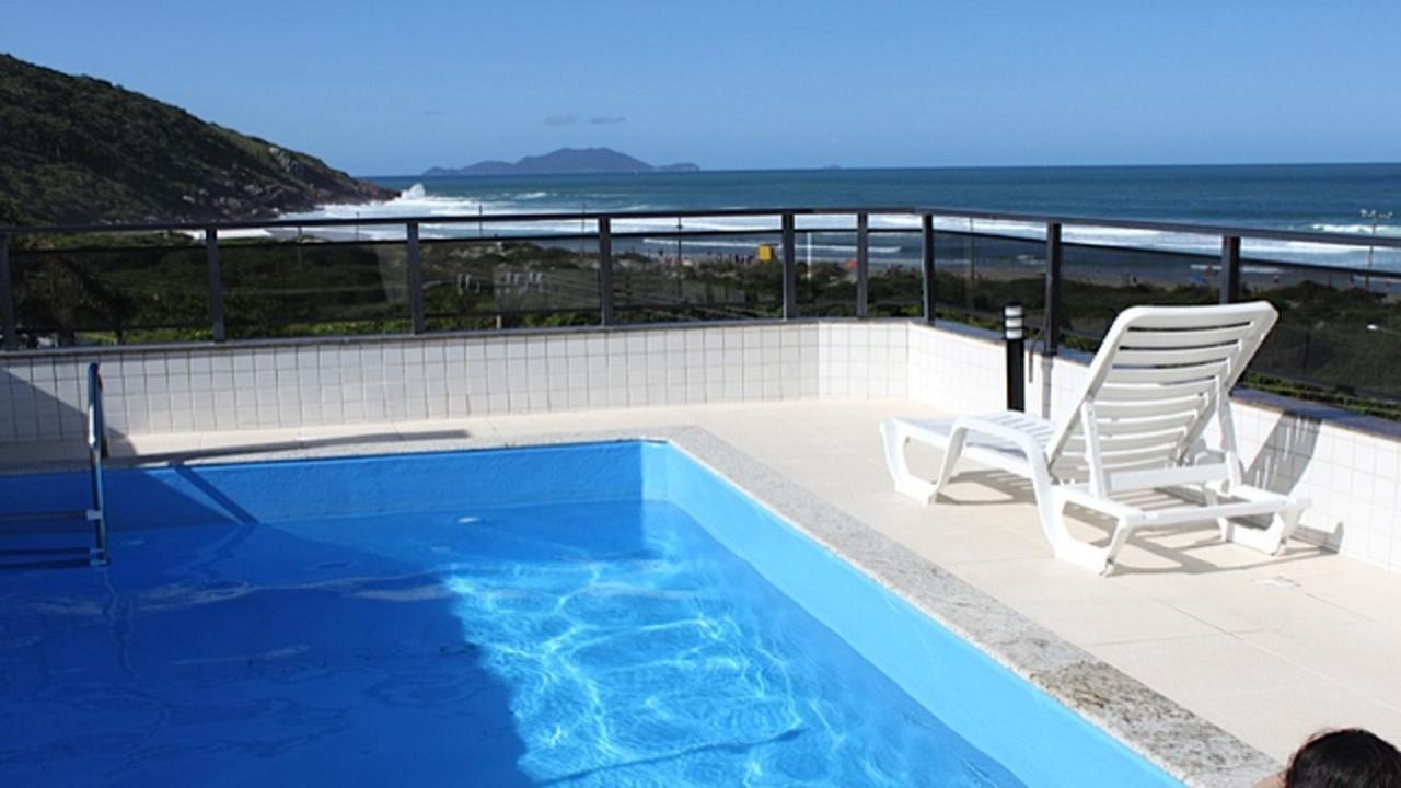 フロリアノポリスLinda Cobertura Frente Mar Com Piscina Privativa E Pe Na Areia!アパートメント エクステリア 写真
